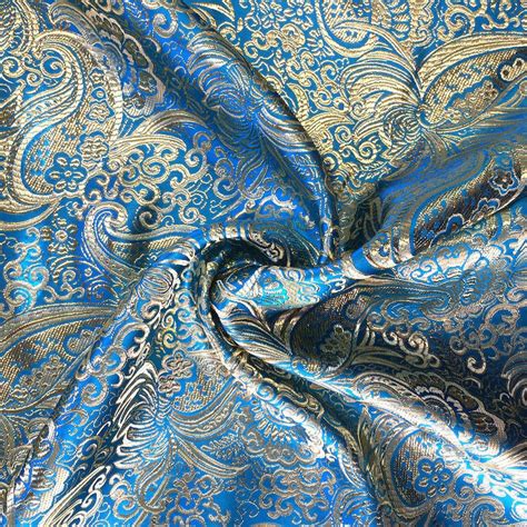 metallic gold and blue fabric|fabric with metallic accents.